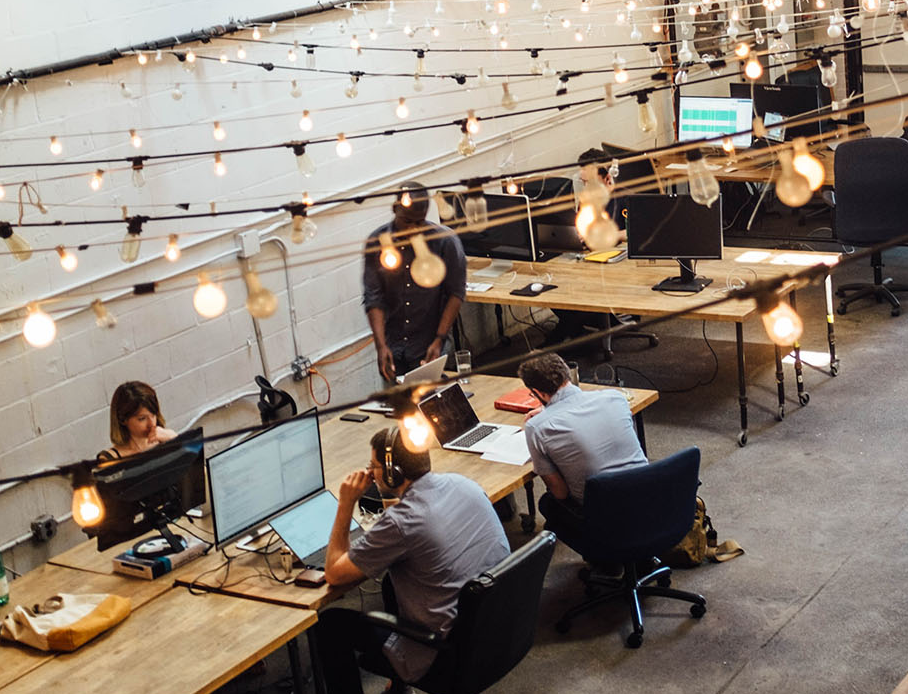 Freelancer-friendly workspace with warm interior design and shared tables